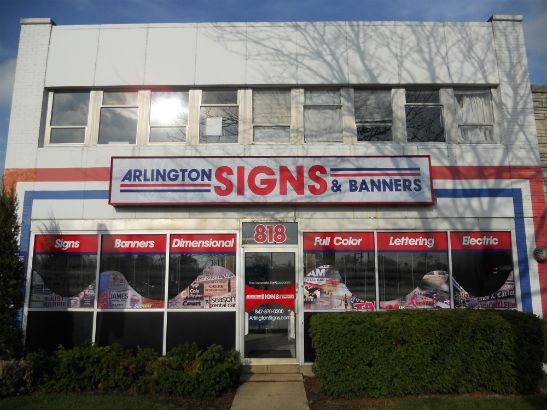 Arlington Signs and Banners.  We combined graphic images with solid bands of text.  Combining products makes for an effective and eye catching storefront.